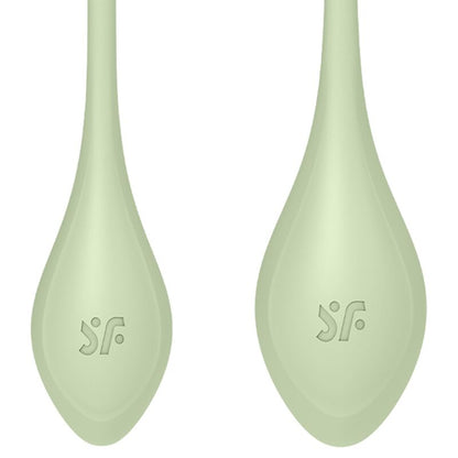 Close-up do conjunto Satisfyer Yoni Power 2 Verde, mostrando as três bolas de treino pélvico de silicone de grau médico.