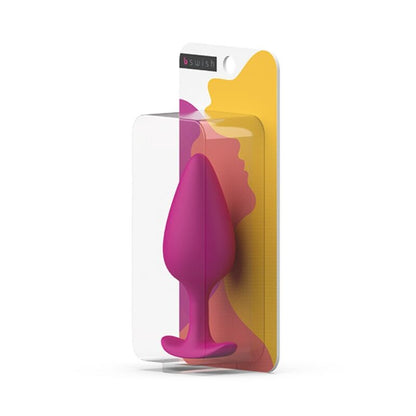 Close-up do B SWISH Plug Prostático BFILLED Basic Plus Magenta, destacando o seu design ergonómico e a textura suave de silicone.