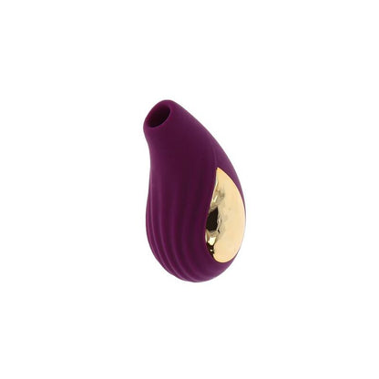 Close-up do Xocoon Estimulador Divine Love Roxo mostrando seu design ergonómico e superfícies texturizadas.