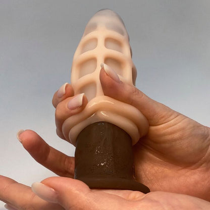 Close-up of the ALIVE Mini Masturbador Oral showing its texture and features.