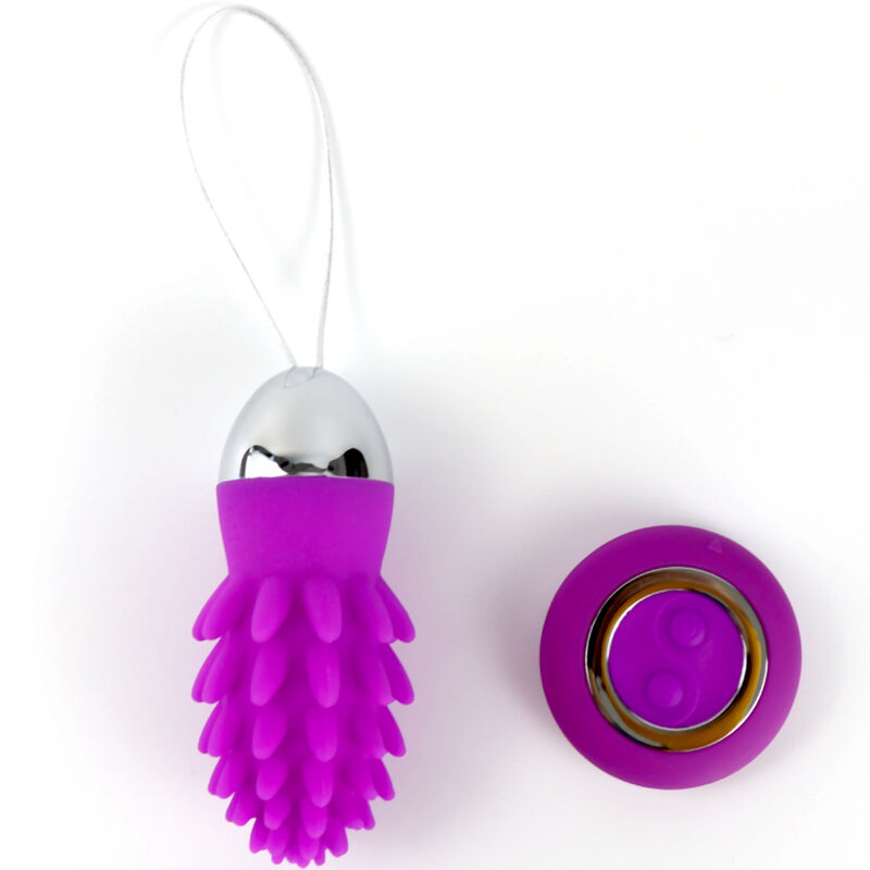 Close-up do Ovo Vibratório Armony Octopus Cactus violeta com controle remoto, destacando sua textura de silicone e design ergonômico.