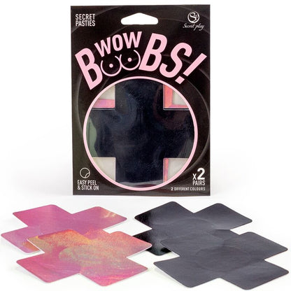 Close-up of SECRET PLAY Protetores de Mamilo Cruz Holográfica, 2 Pares, showing the black and pink designs.