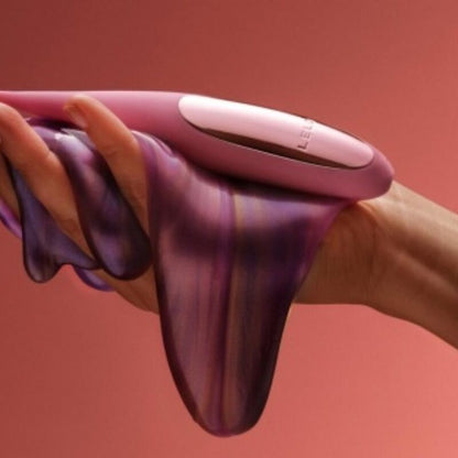 Lelo Estimulador de Clitóris DOT Travel Roxo com detalhes do design e material.