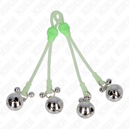 Close-up of the KINK Pinças para Mamilos Crânio Luminosas com Sinos Ajustáveis, showing luminous skull design and metal texture.