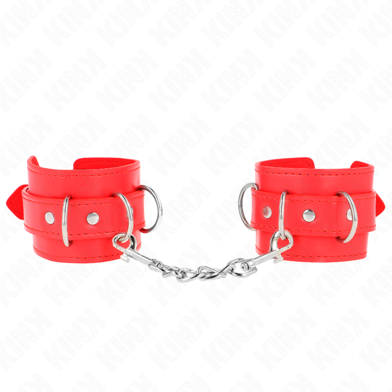 Close-up das retenções de pulso KINK D-Ring ajustáveis em vermelho.