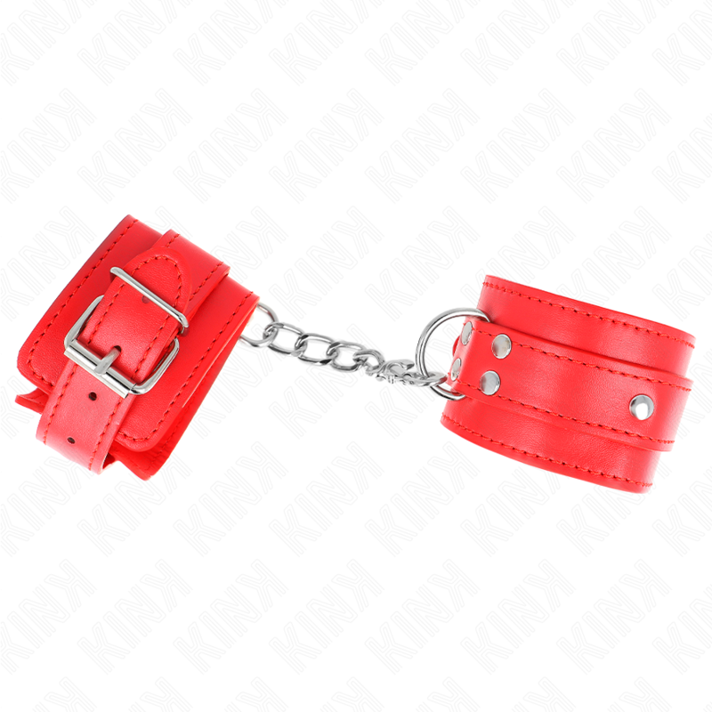 Close-up das retenções de pulso KINK D-Ring ajustáveis em vermelho.