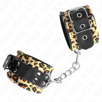 Detalhe das Algemas de Pulso KINK em Couro Real padrão Leopardo, mostrando o fecho e o material.