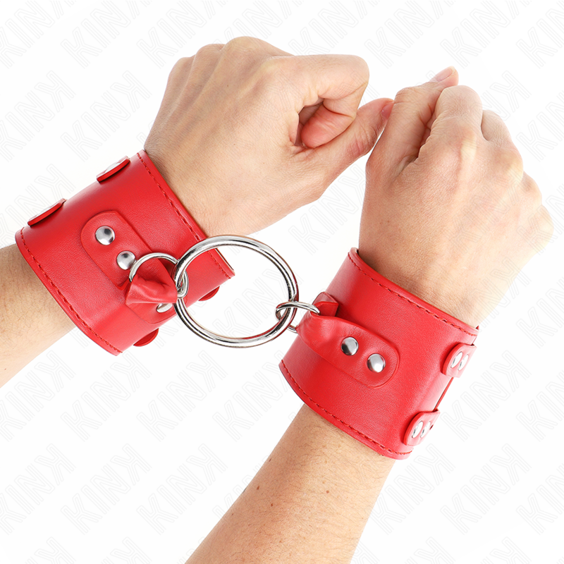 KINK Algema de Pulso Vermelha Fixo com Anel e Pregos Ajustáveis, ideal para BDSM.