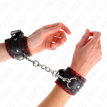 Algema de pulso KINK ajustável com forro de pele em vermelho e preto.