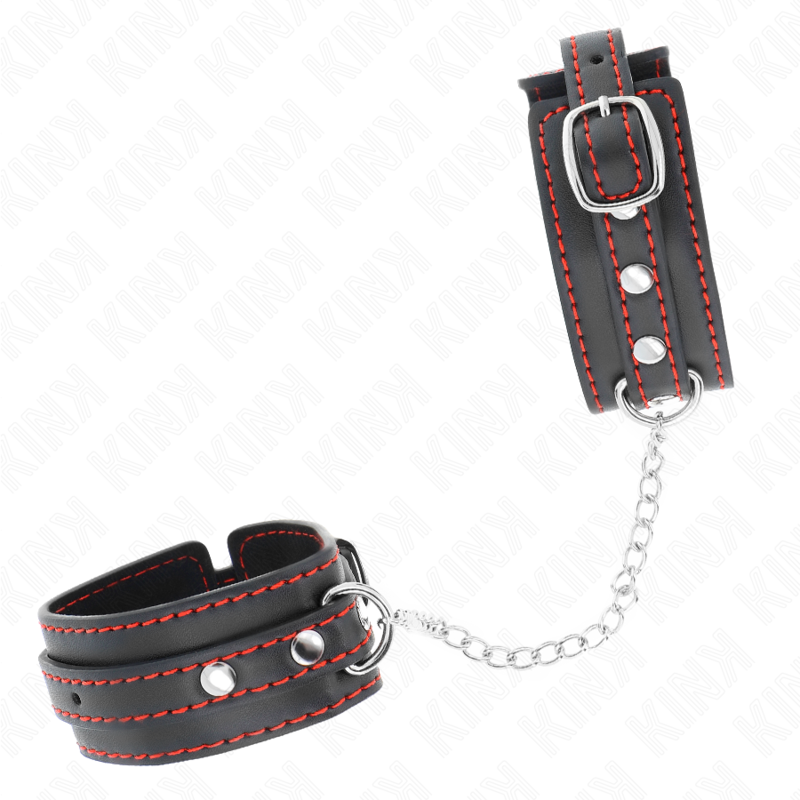 Punhos KINK pretos ajustáveis com forro vermelho para BDSM, exibindo o design e o material de alta qualidade.