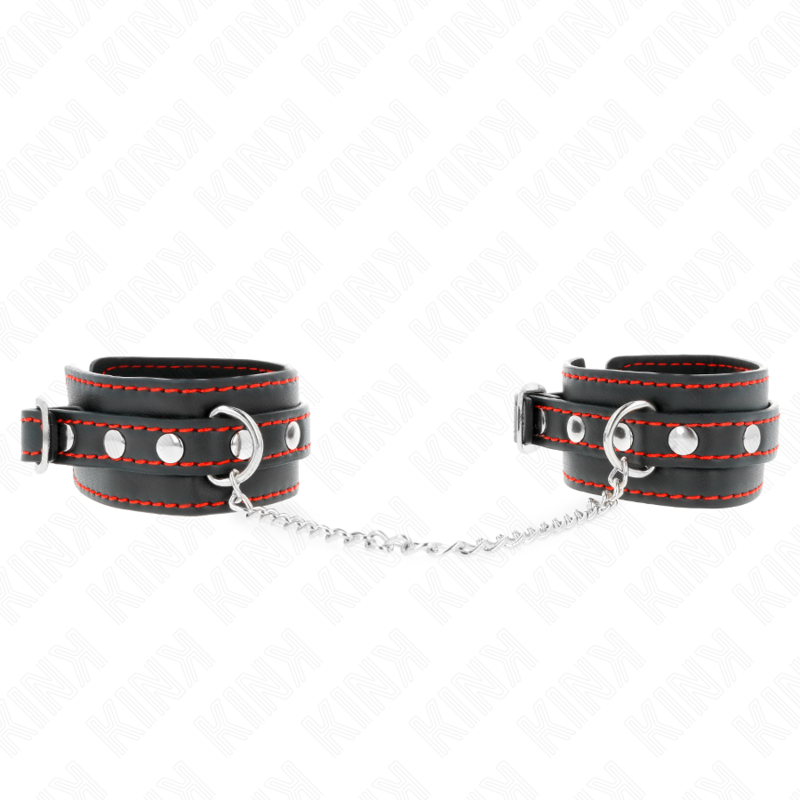 Punhos KINK pretos ajustáveis com forro vermelho para BDSM, exibindo o design e o material de alta qualidade.