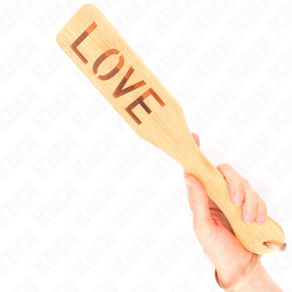 KINK Paleta de Bambu Palavra Amor 32x5,5cm para BDSM, exibindo o design e a gravação 'Amor'.