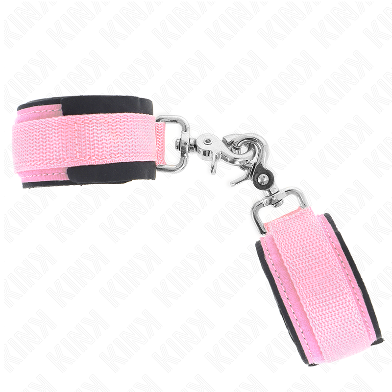 Close-up dos Punhos de Neoprene Ajustáveis KINK Rosa (22-34cm), mostrando o material macio e a fivela.