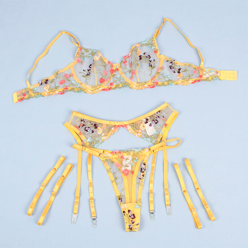Conjunto de lingerie SUBBLIME floral amarelo, com sutiã, tanga e cinto-liga, exibindo detalhes e design.