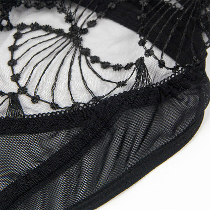 Body transparente com renda preta oca S/M da SUBBLIME, destacando o design sensual e elegante.