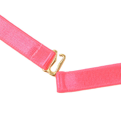 Close-up of the SUBBLIME Conjunto Lingerie Rosa Fluorescente with collar and leg details, showing its sensual design and vibrant color.