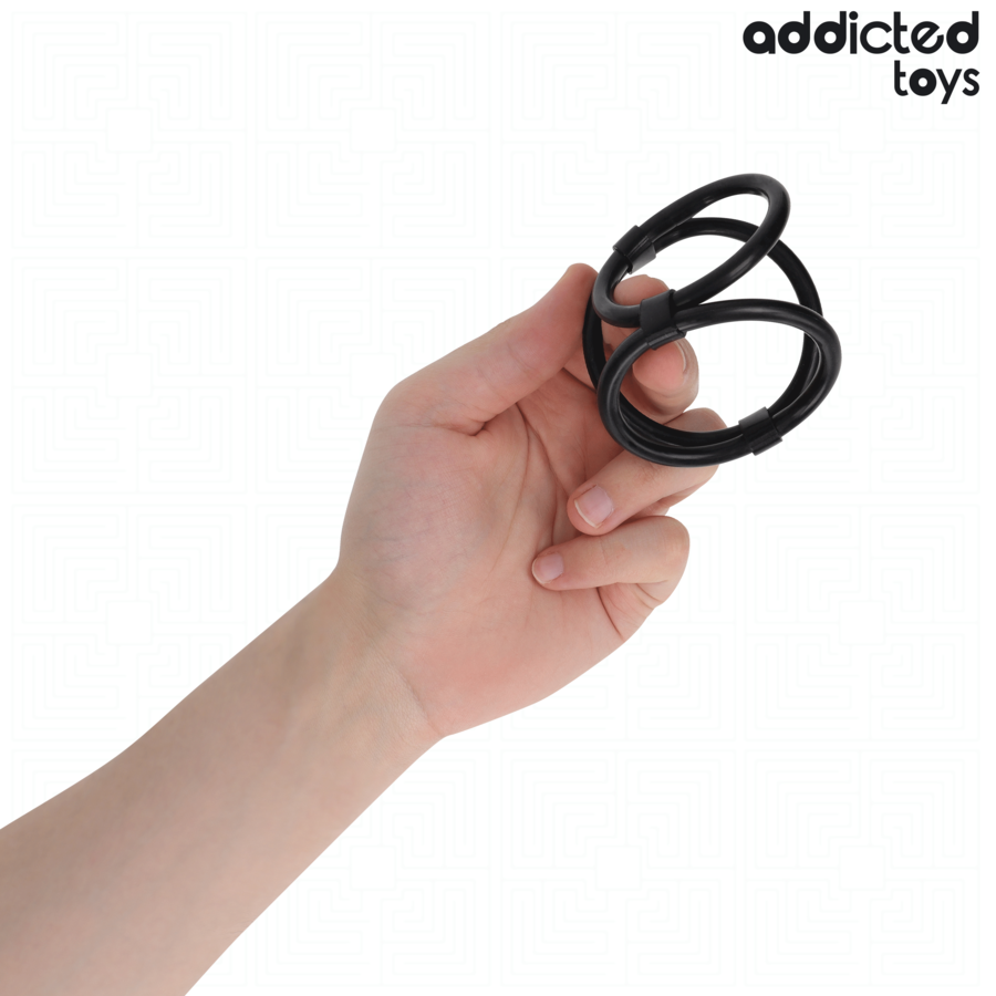 Close-up of the ADDICTED TOYS Anel Triplo Peniano, showing its flexible material and three ring design.