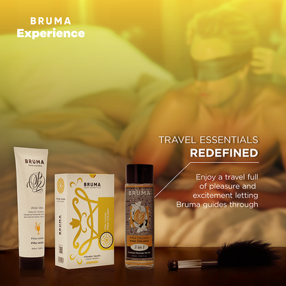 BRUMA XPERIENCE Kit Vibro-Orgásmico Pina Colada, mostrando os componentes do kit: vibrador líquido, lubrificante, óleo, pena e venda.