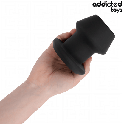 Plug Anal Extremo Oco Addicted Toys de silicone, detalhe do design e dimensões.