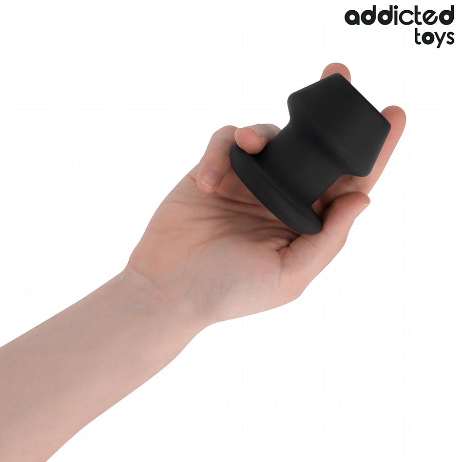 Close-up do ADDICTED TOYS Plug Anal Oco Extremo S, mostrando seu design inovador em silicone macio e oco.