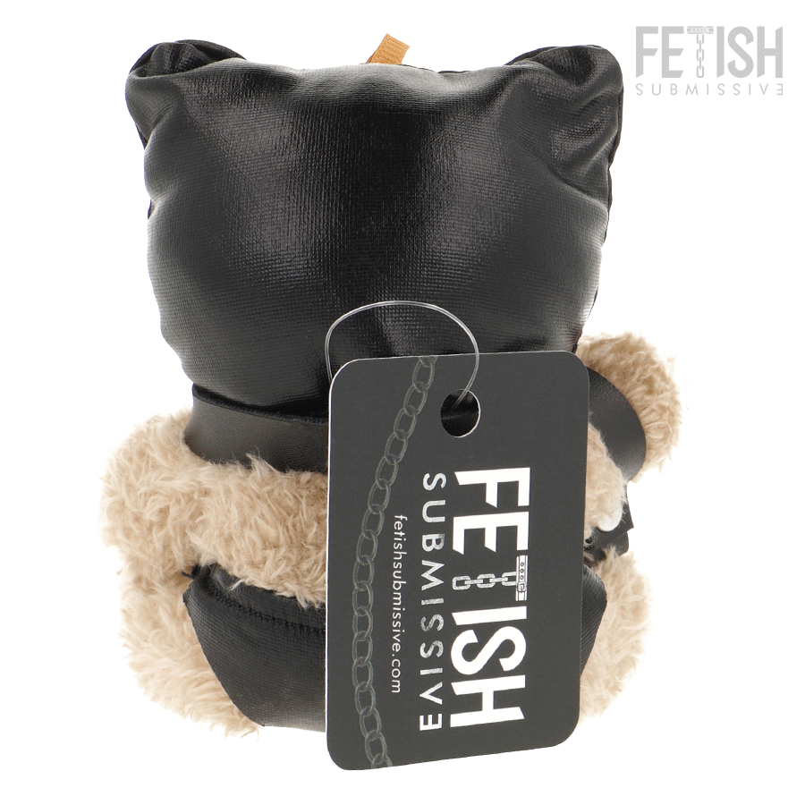 Urso de Pelúcia BDSM Luno da FETISH SUBMISSIVE com máscara preta e chicote, detalhes de arreios e correntes.