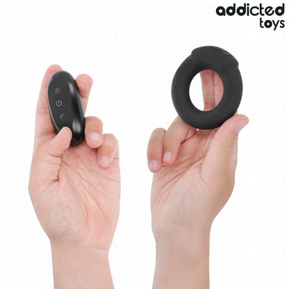 Anel peniano vibrante Addicted Toys com efeito de aquecimento e controle remoto para prazer de casais.