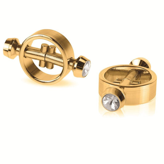 Close-up dos Grampos Magnéticos para Mamilos FETISH FANTASY GOLD, destacando o design luxuoso e acabamento metálico.