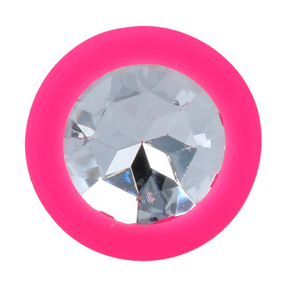 Plug anal Intense Shelki S fúcsia em silicone médico, com base em diamante, visto de perto.