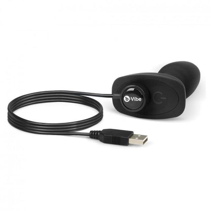 Close-up do Plug Anal Rimming Petite B-VIBE com Controle Remoto, destacando seu design ergonômico e acabamento em silicone.