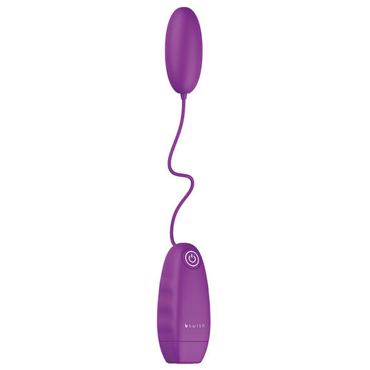 B SWISH Bala Vibrante Clássica Bnaughty em roxo, destacando seu design compacto e elegante para estimulação precisa.