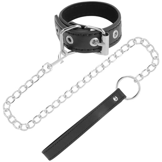 Anel peniano Darkness com alça e corrente para BDSM, em couro vegano preto e detalhes metálicos.