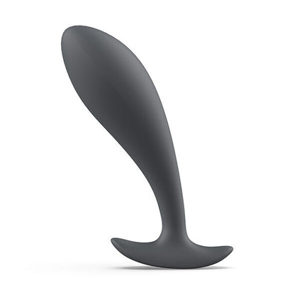 Close-up do B SWISH Plug Prostático BFILLED Básico Ardosia, destacando seu design ergonômico e material de silicone macio para estimulação da próstata.