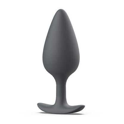 Close-up of the B SWISH BFILLED BASIC PLUS Plug Prostático com Vibração Interna, showing its slate color and ergonomic design.